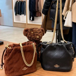 Premium black slouchy cloud bag with elegant gold chain strap from Hype Outfit Shop
