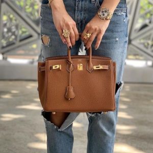 Luxury brown tan leather classic retro style handbag with dual rolled handles from Hype Outfit Shop